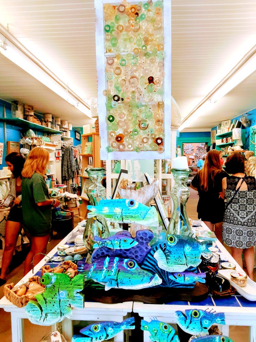 A store full of nautical gifts and a seaglass window are shown